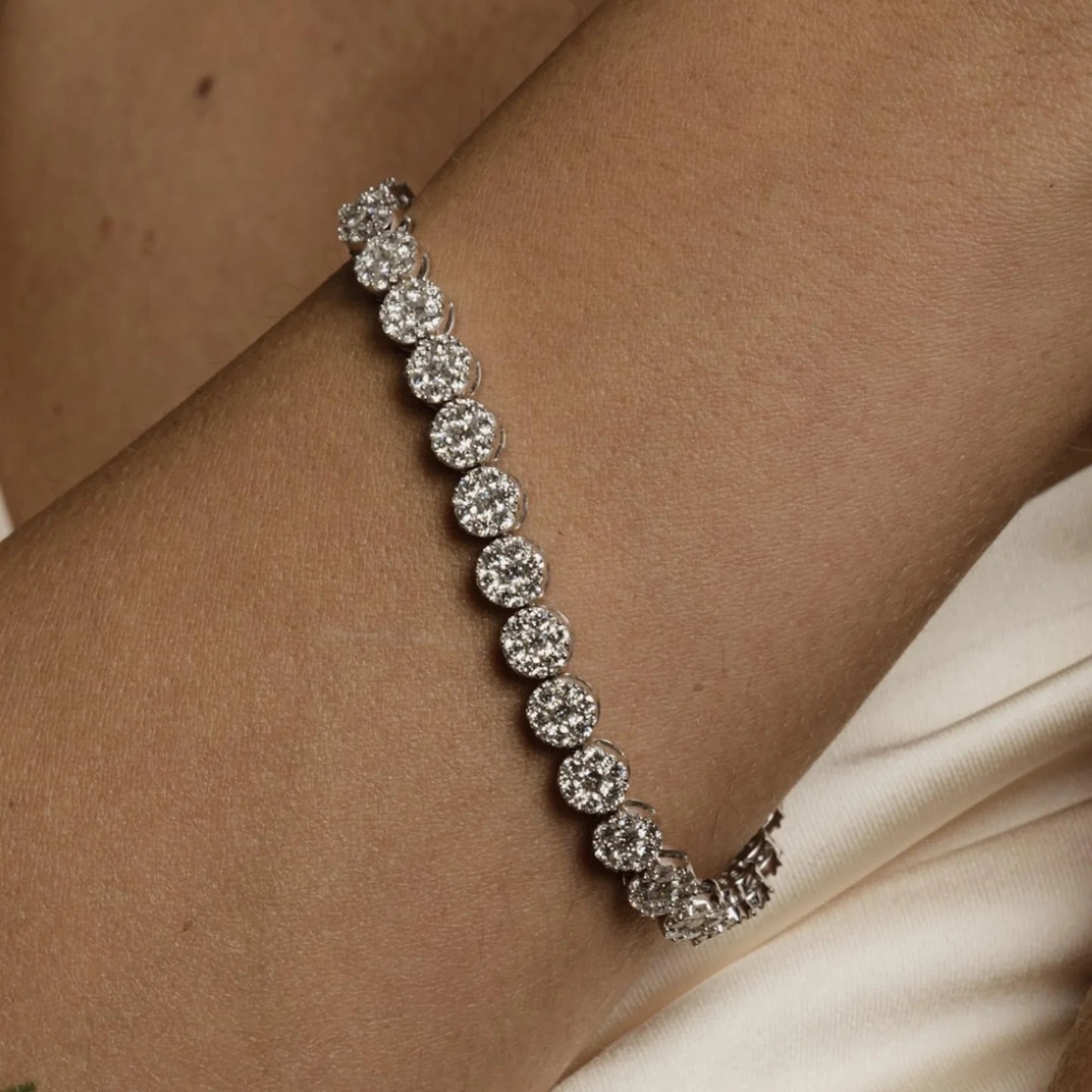 Diamond cluster tennis bracelet