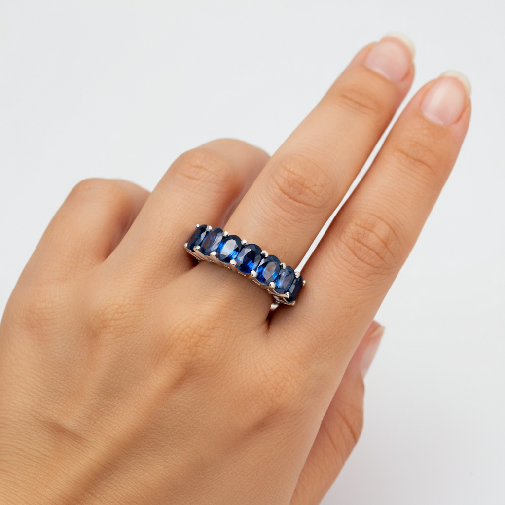 Oval blue sapphire 1/2 band