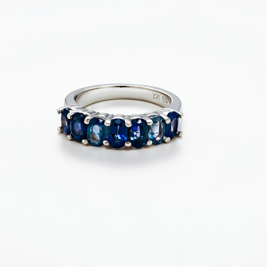 Oval blue sapphire 1/2 band