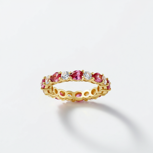 Pear-shape pink sapphire eternity band